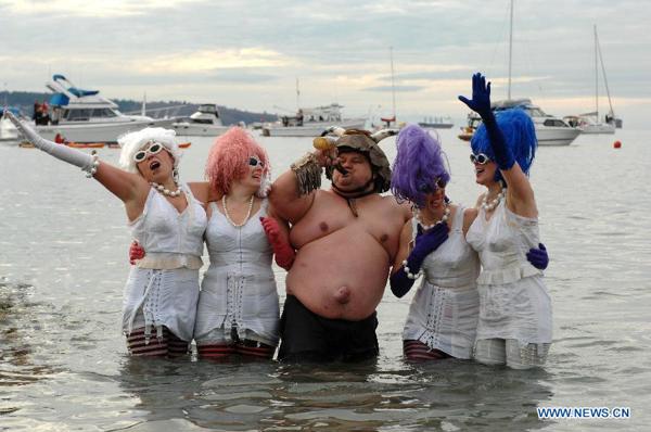 Where & when did the "POLAR BEAR SWIM" originate? Who created the New Years Day Tradition?