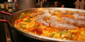 Spanish Paella Day - Can anybody tell me about the origin of the spanish paella? I really need it by tonite!?
